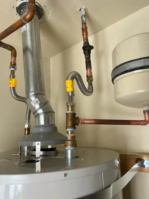 Water heater installation and plumbing repair in Mead